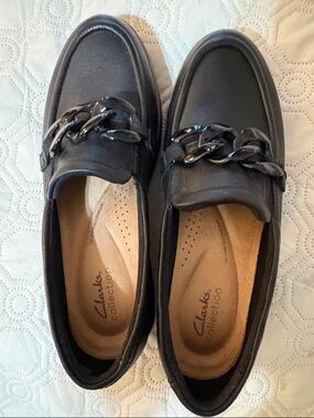 Clarks Black Loafers with Glossy Chain Accent